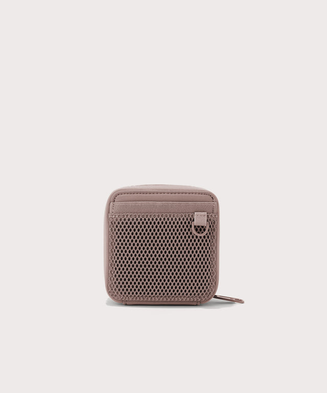 Dagne Dover small Arlo Tech Organizer in pink seen from the back.
