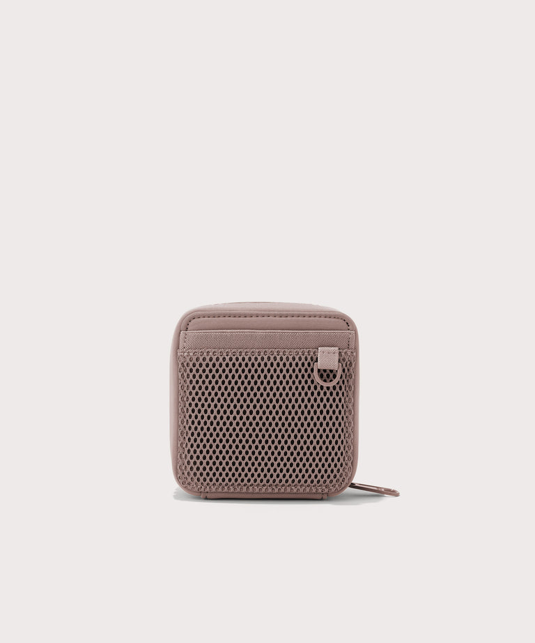 Dagne Dover small Arlo Tech Organizer in pink seen from the back.
