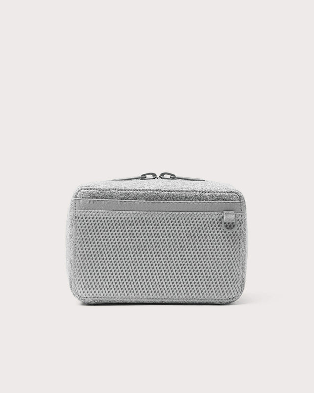 Dagne Dover large Arlo Tech Organizer in grey seen from the back.
