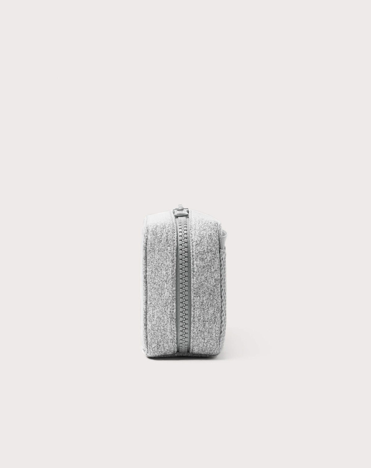 Dagne Dover large Arlo Tech Organizer in grey seen from the side.
