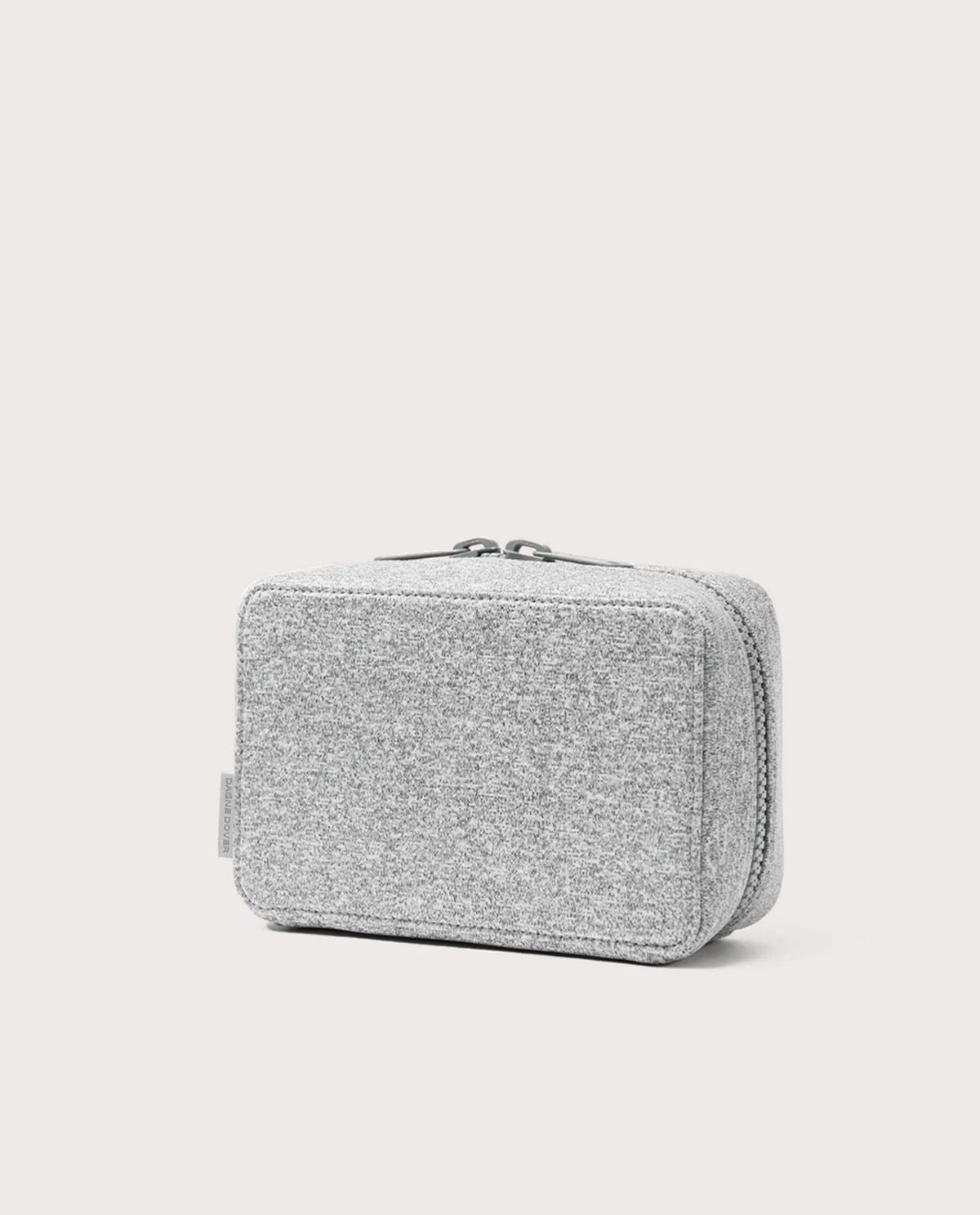 Dagne Dover large Arlo Tech Organizer in grey seen from an angle.
