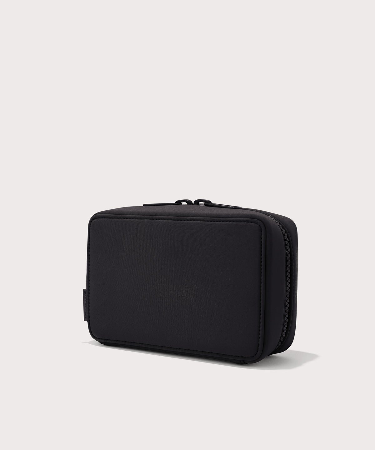 Dagne Dover large Arlo Tech Organizer in black seen from an angle.
