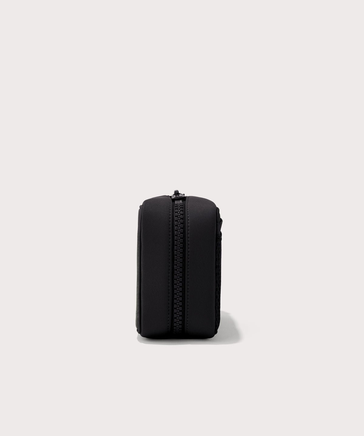 Dagne Dover large Arlo Tech Organizer in black seen from the side.
