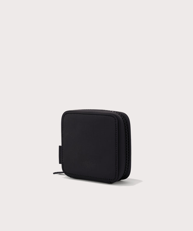Dagne Dover small Arlo Tech Organizer in black seen from an angle.
