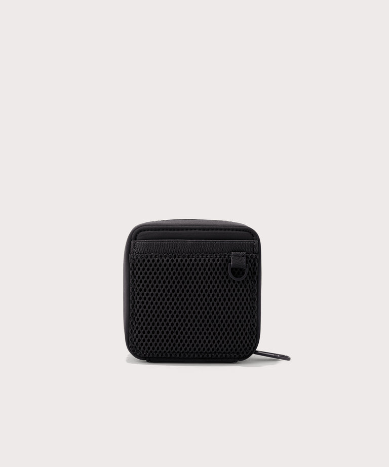 Dagne Dover small Arlo Tech Organizer in black seen from the back.
