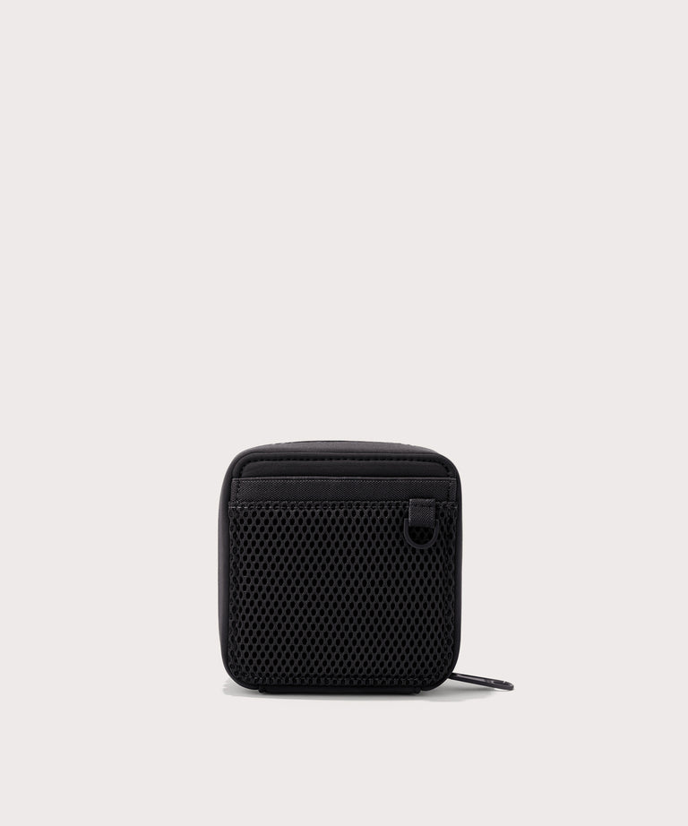 Dagne Dover small Arlo Tech Organizer in black seen from the back.