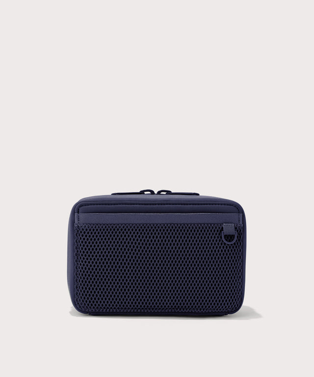 Dagne Dover large Arlo Tech Organizer in dark blue seen from the back.