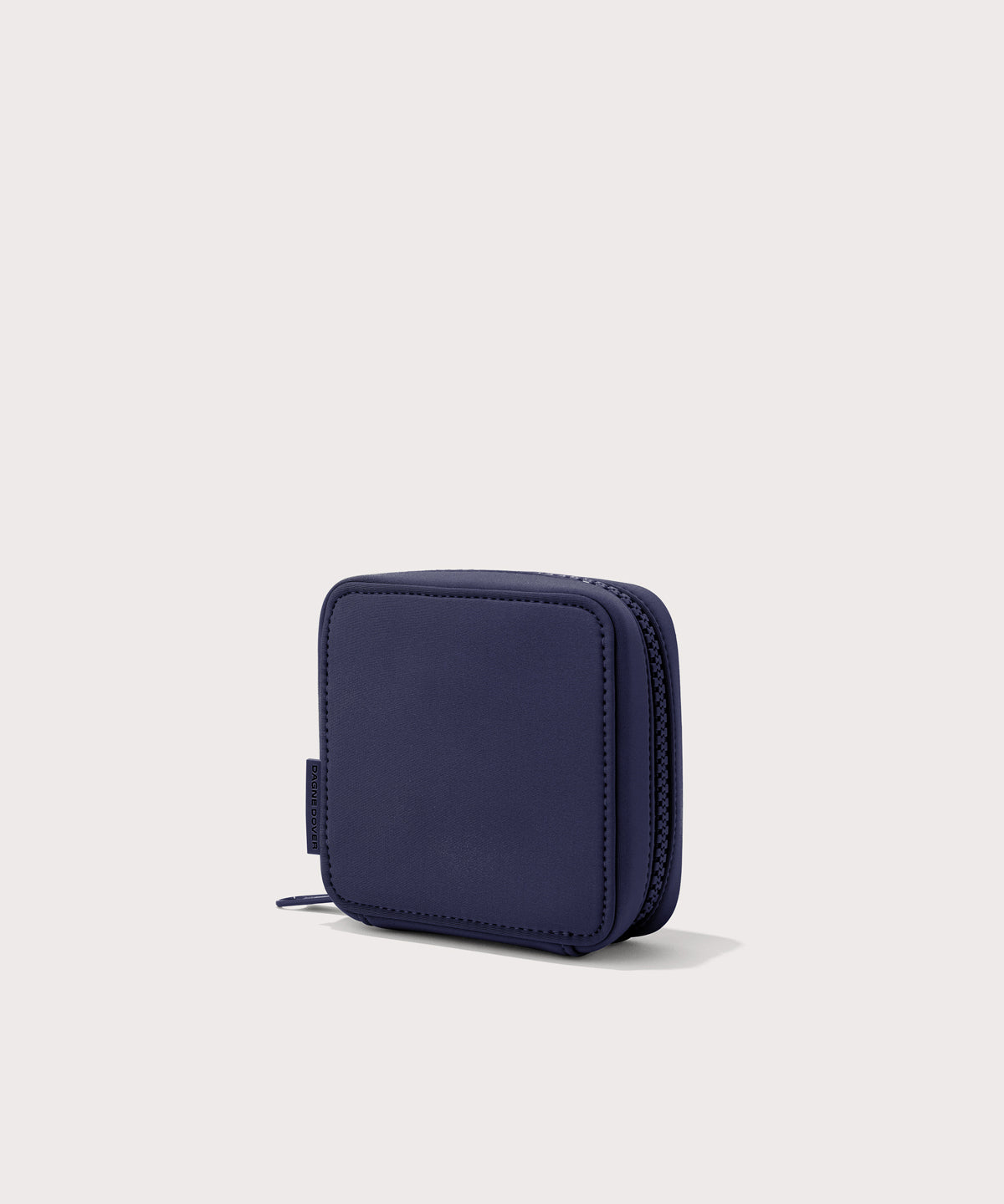 Dagne Dover small Arlo Tech Organizer in  dark blue seen from an angle.
