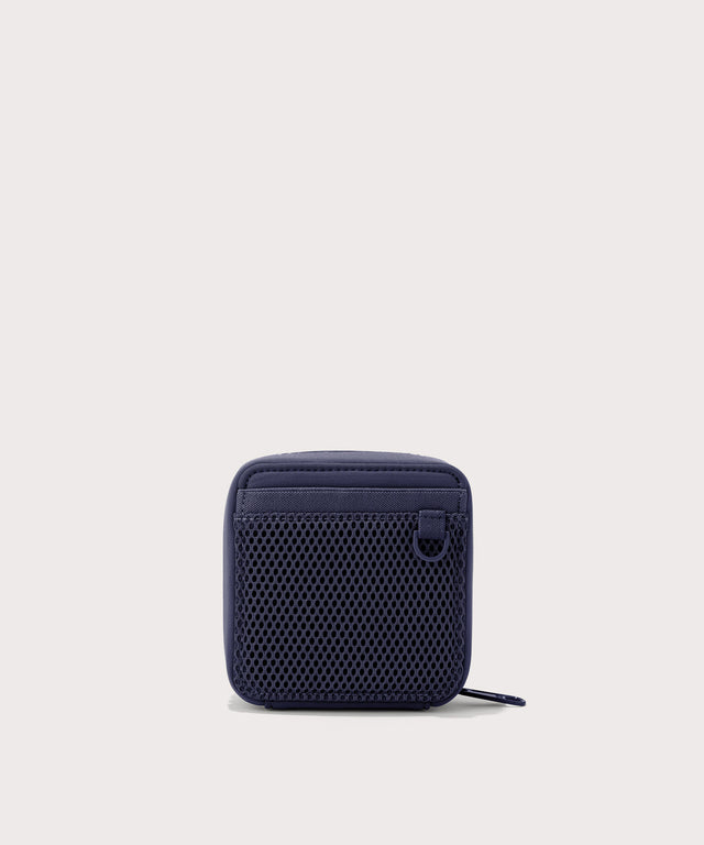 Dagne Dover small Arlo Tech Organizer in  dark blue seen from the back.
