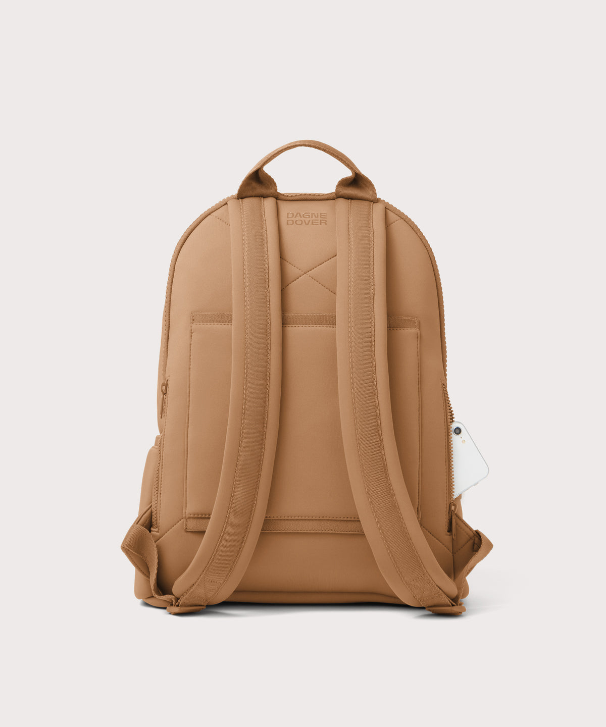 Dagne Dover large Dakota Neoprene Backpack in camel seen from the back.
