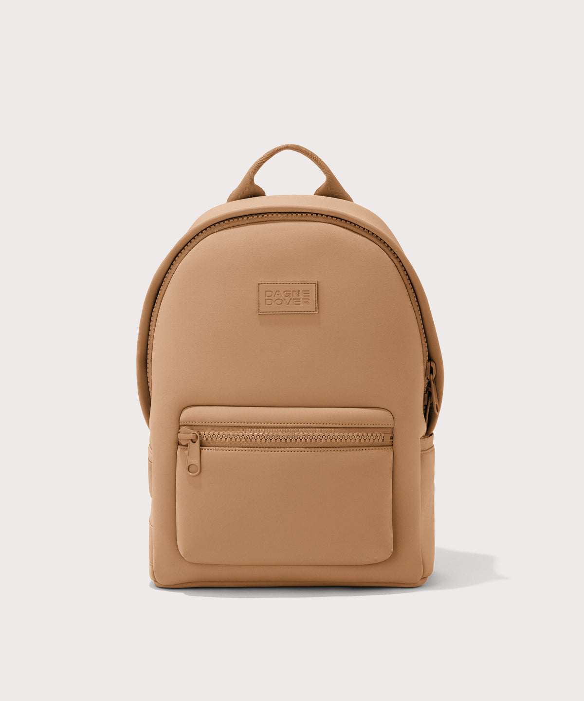 Dagne Dover medium Dakota Neoprene Backpack in camel brown.