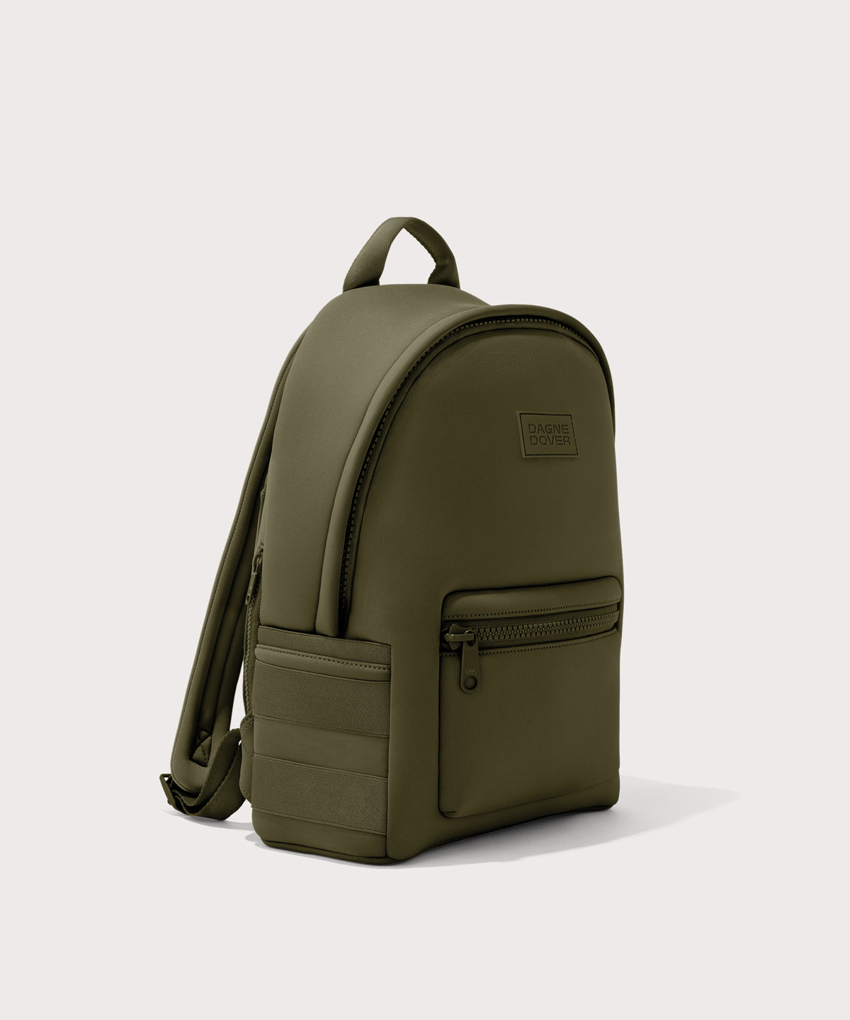 Dagne Dover medium Dakota Neoprene Backpack in dark moss seen from an angle.
