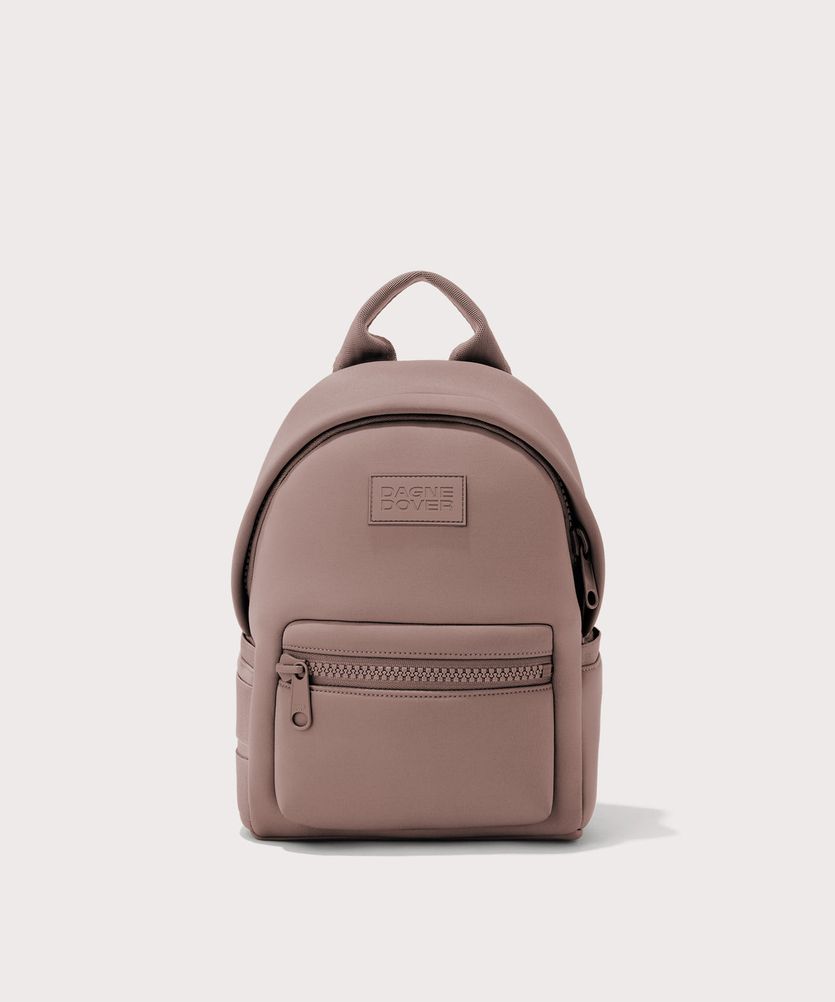 Dagne Dover Dakota Small Neoprene Backpack in pink.