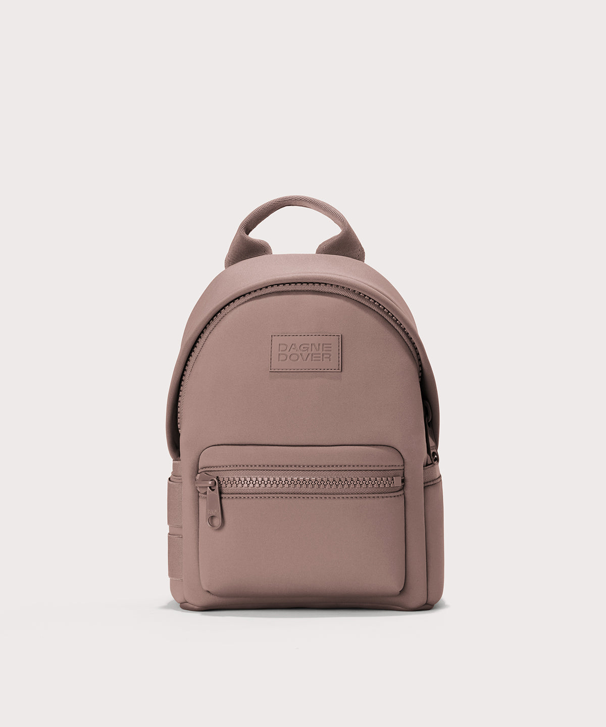 Dagne Dover Dakota Small Neoprene Backpack in pink.