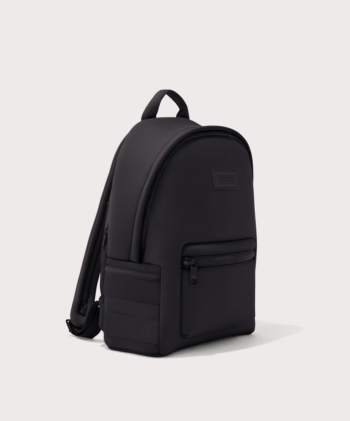Dagne Dover medium Dakota Neoprene Backpack in onyx seen from an angle.
