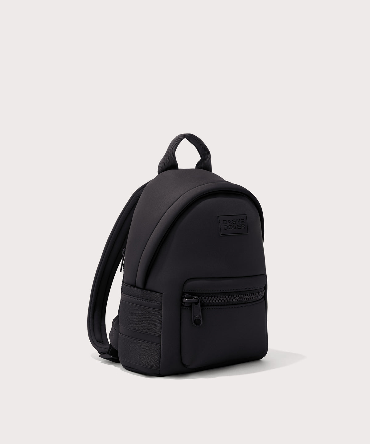 Dagne Dover small Dakota Neoprene Backpack in black seen from an angle.
