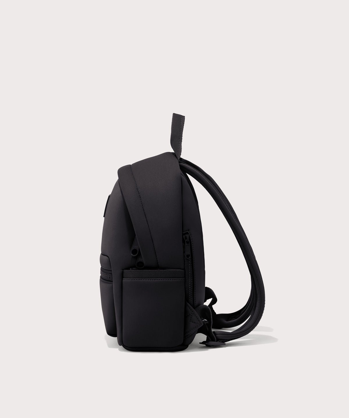 Dagne Dover small Dakota Neoprene Backpack in black seen from the side.
