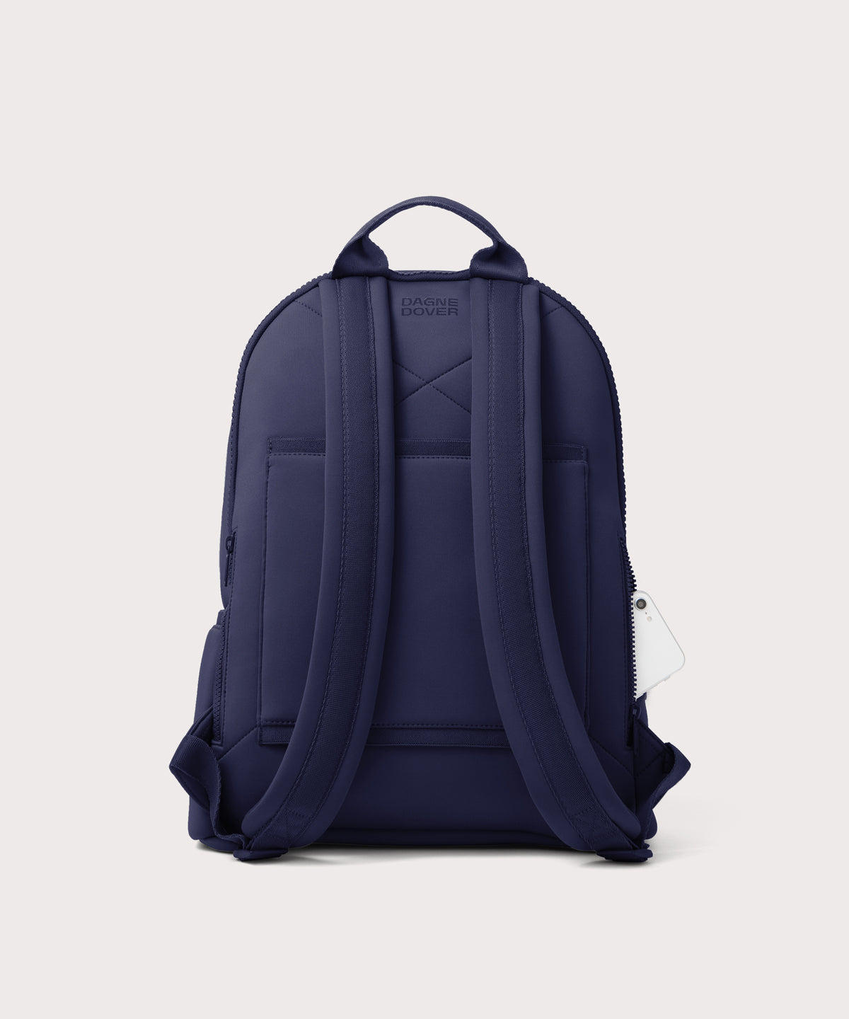 Dagne Dover large Dakota Neoprene Backpack in dark blue seen from the back.
