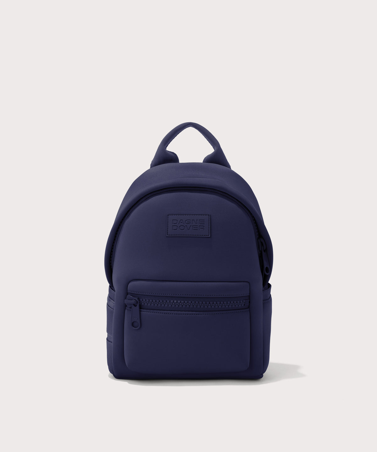 Dagne Dover Dakota Small Neoprene Backpack in dark blue.