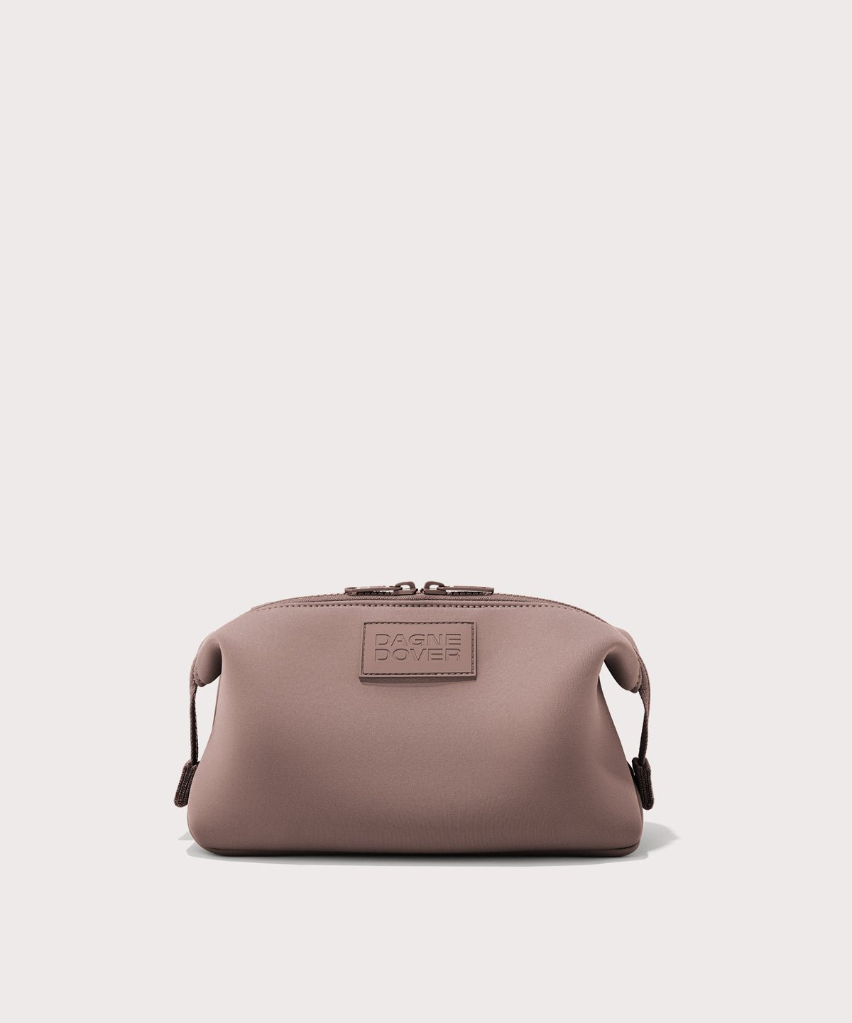Dagne Dover Large Hunter Toiletry Bag in pink.
