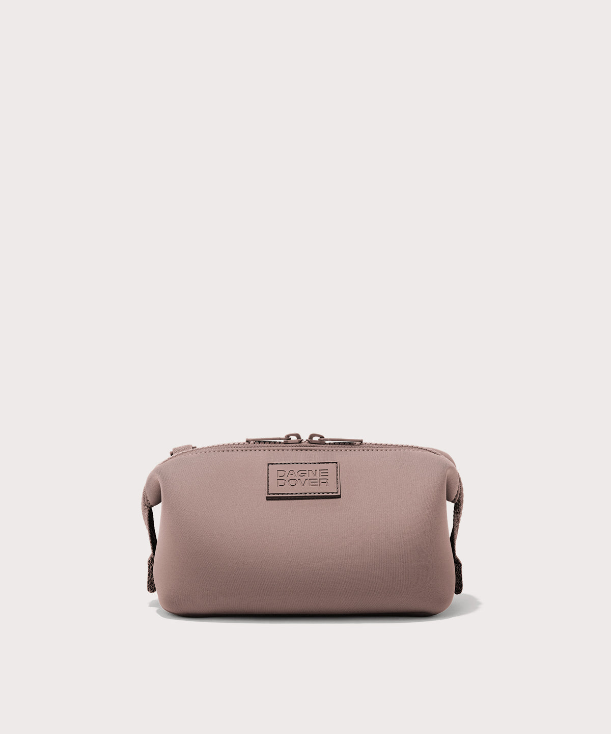 Dagne Dover Small Hunter Toiletry Bag in pink.