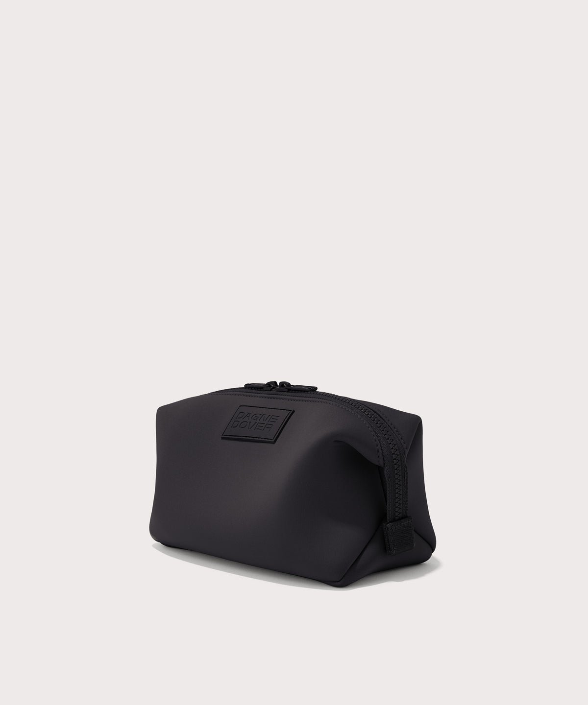 Dagne Dover Large Hunter Toiletry Bag in black seen from an angle.
