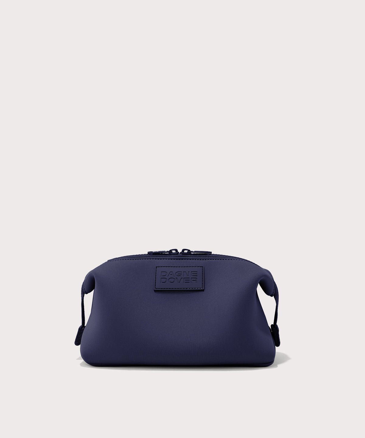 Dagne Dover Large Hunter Toiletry Bag in dark blue.