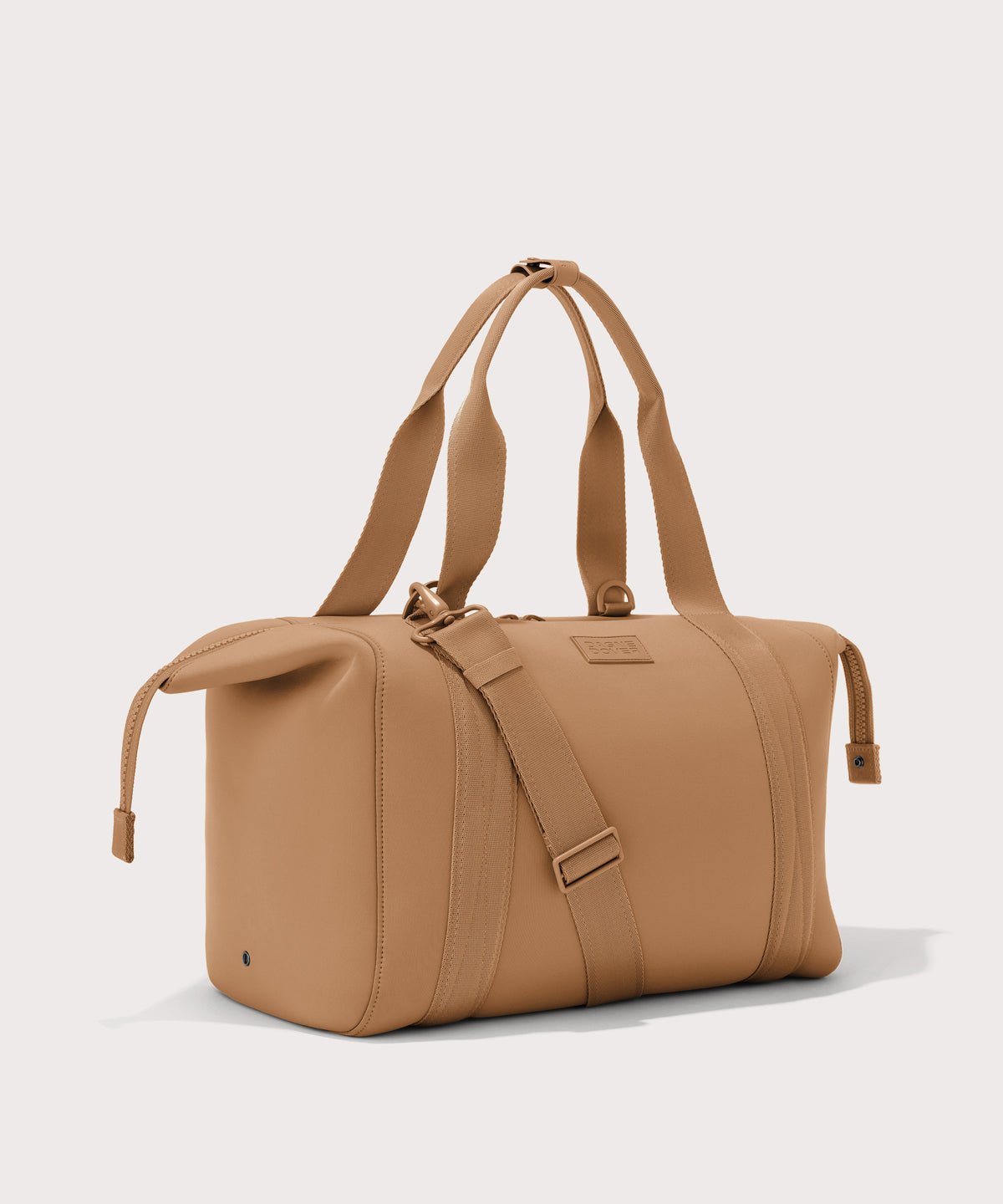 Large Landon Carryall in brown camel with zippers unbuckled
