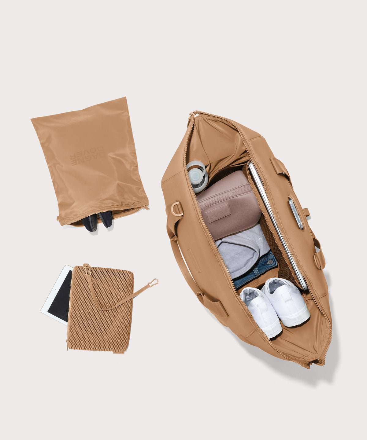 Extra large Landon Carryall in camel brown unzipped, top down view. 
