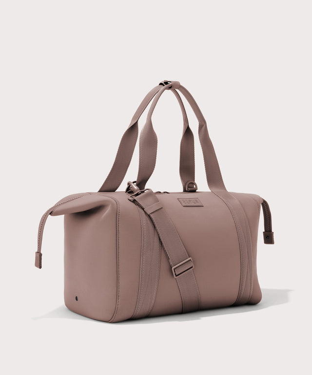 Large Landon Carryall in pink with zippers unbuckled
