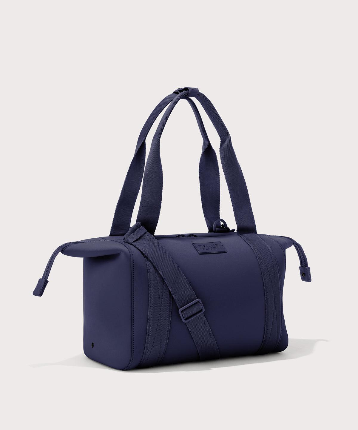Large Landon Carryall in dark blue with zippers unbuckled
