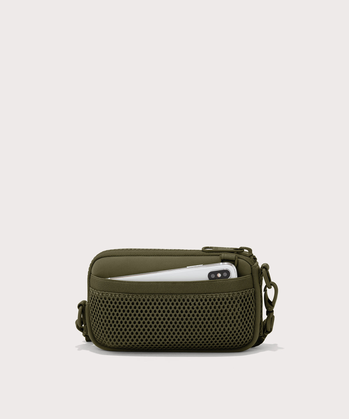 Dagne Dover Mara Phone Sling in dark green showing the exterior air mesh slip.
