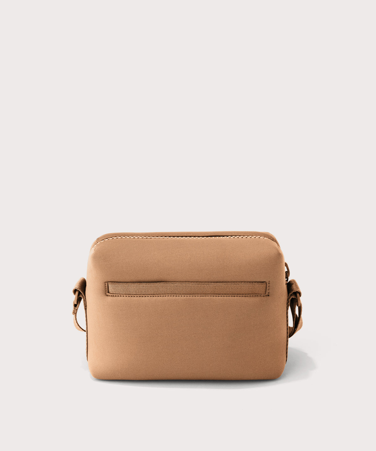 Dagne Dover Micah Crossbody in brown camel seen from the back.

