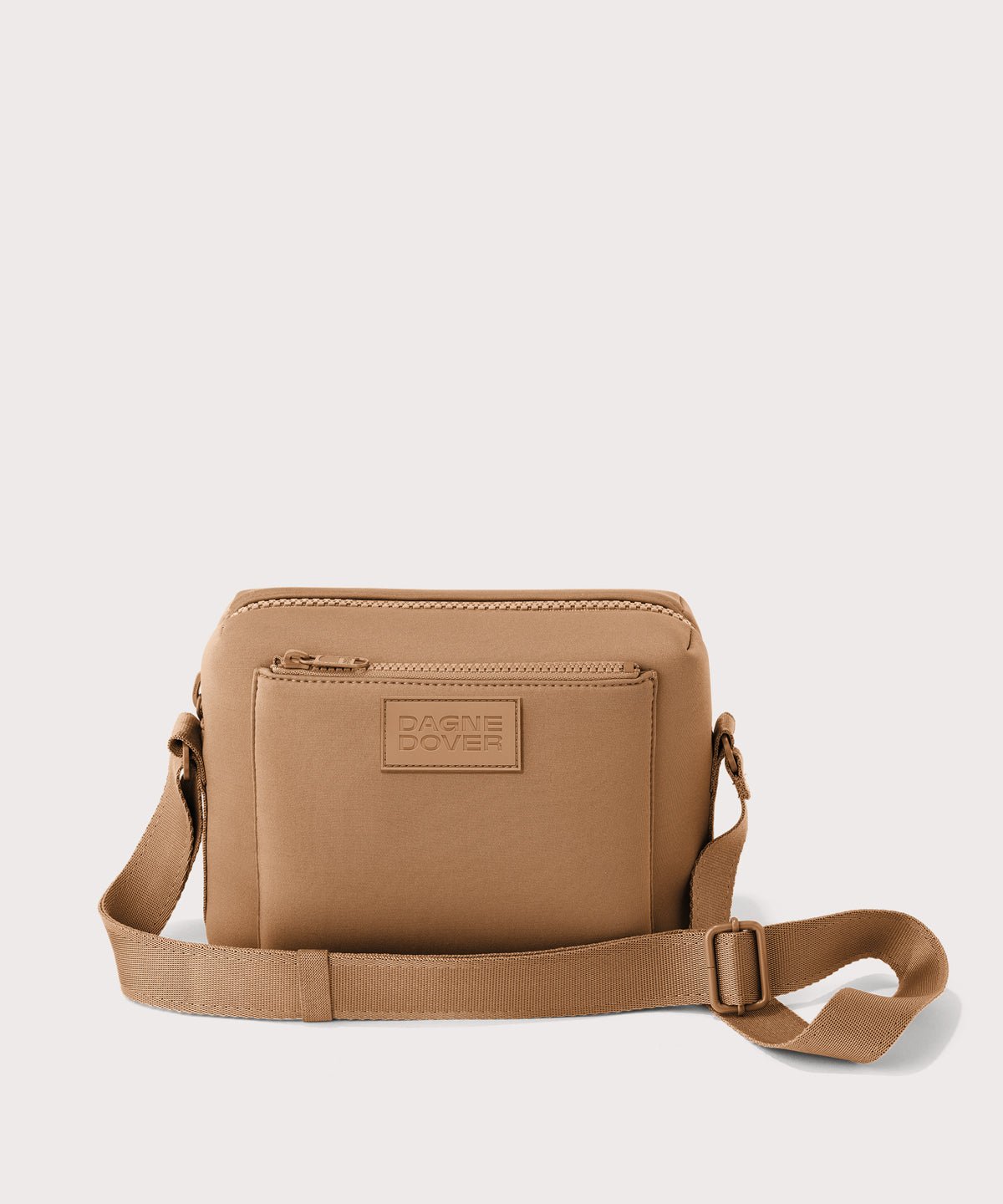 Dagne Dover Micah Crossbody in brown camel.
