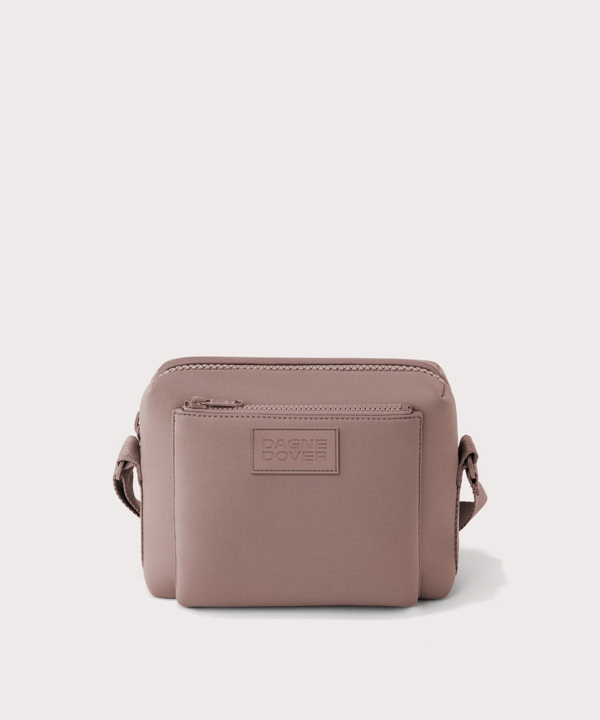 Dagne Dover Micah Crossbody in pink.
