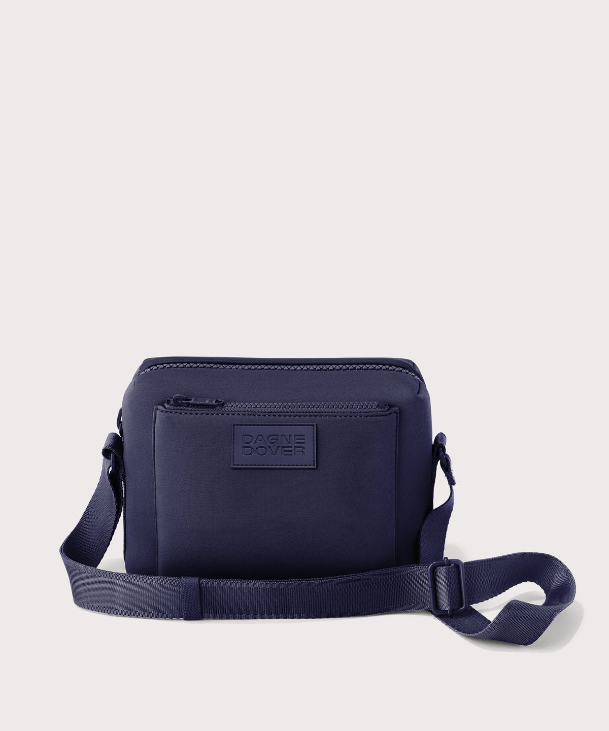 Dagne Dover Micah Crossbody in dark blue.
