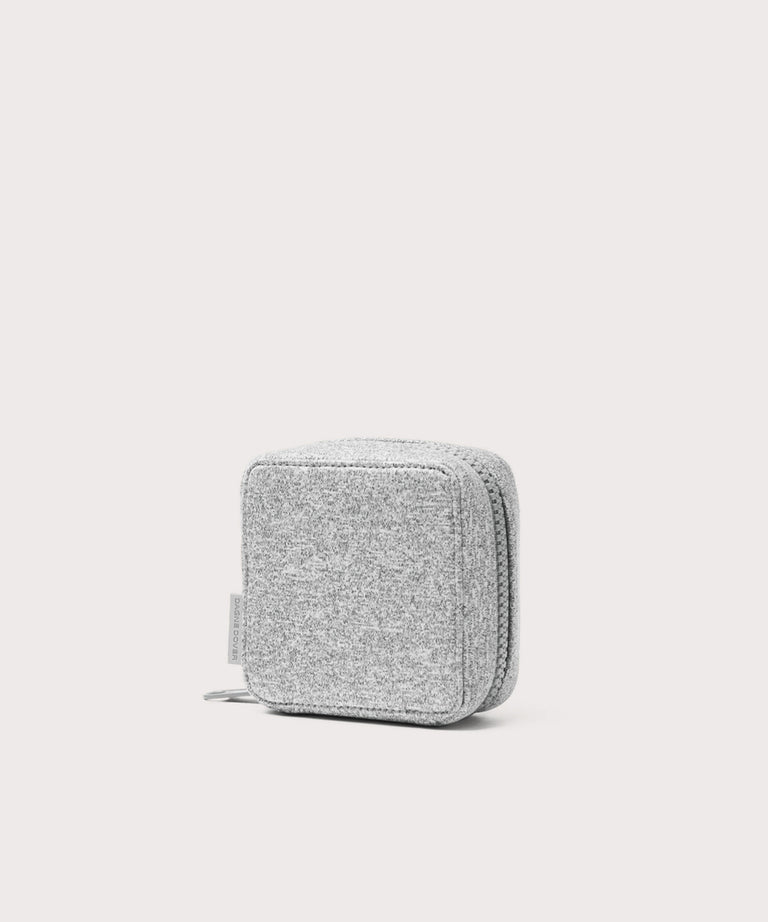 Dagne Dover small Arlo Tech Organizer in grey seen from an angle.
