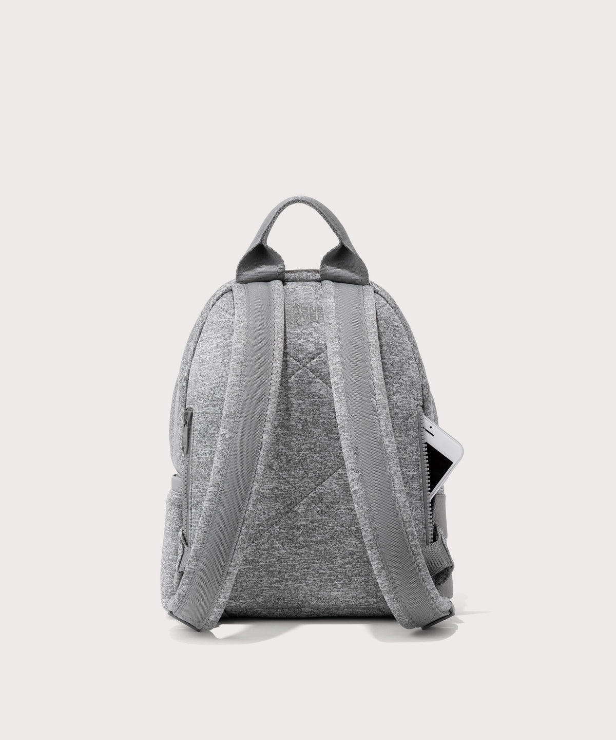 Dagne Dover small Dakota Neoprene Backpack in grey seen from the back.
