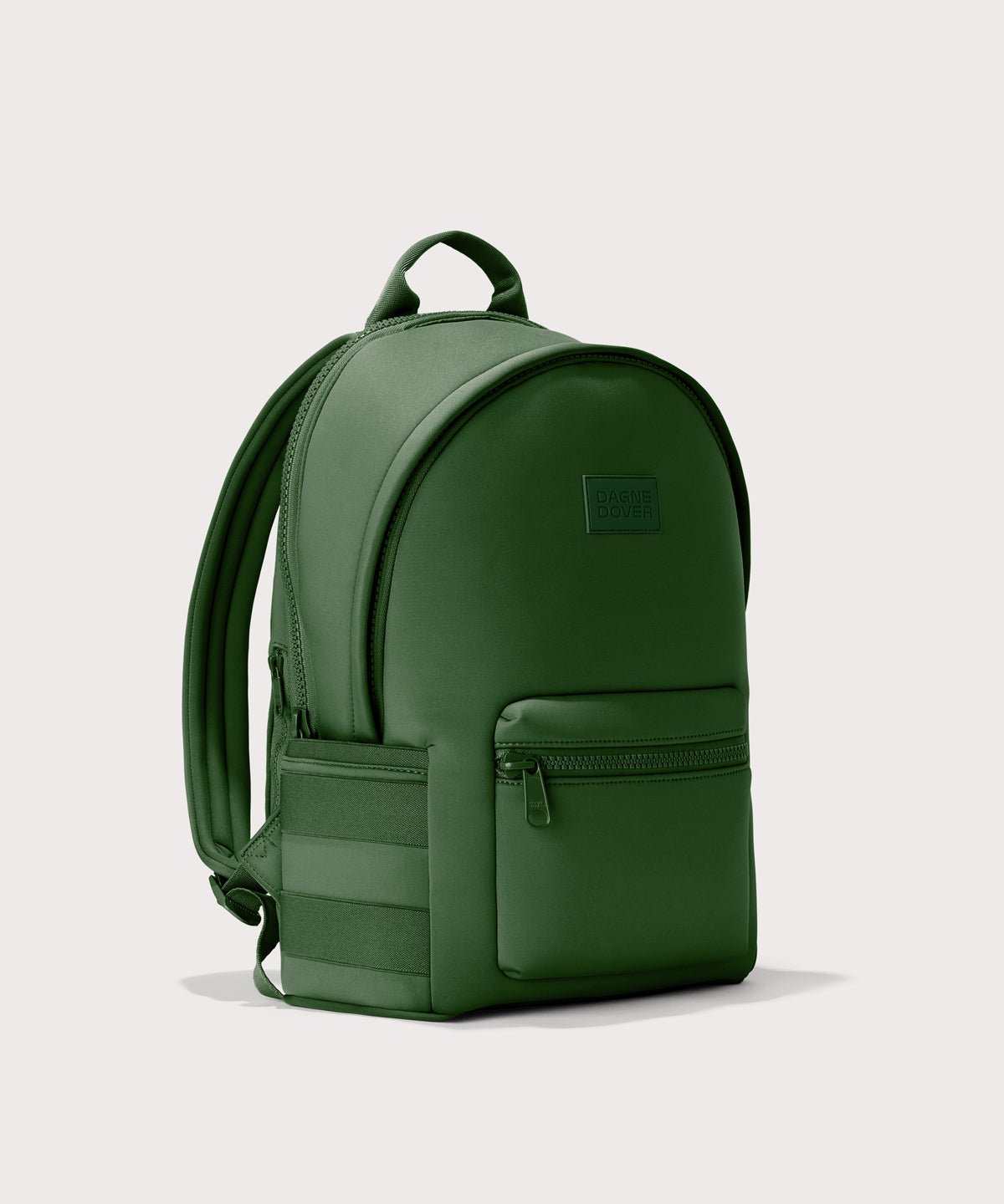 Dagne Dover large Dakota Neoprene Backpack in a rich, classic forest green seen from an angle.
