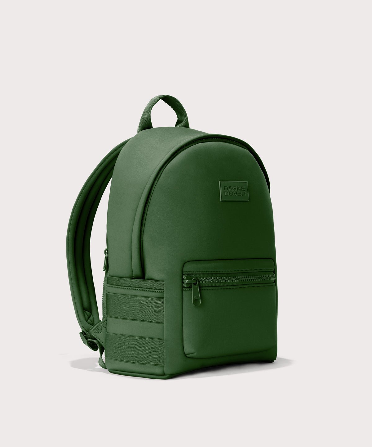 Dagne Dover medium Dakota Neoprene Backpack in a rich, classic forest green seen from an angle.
