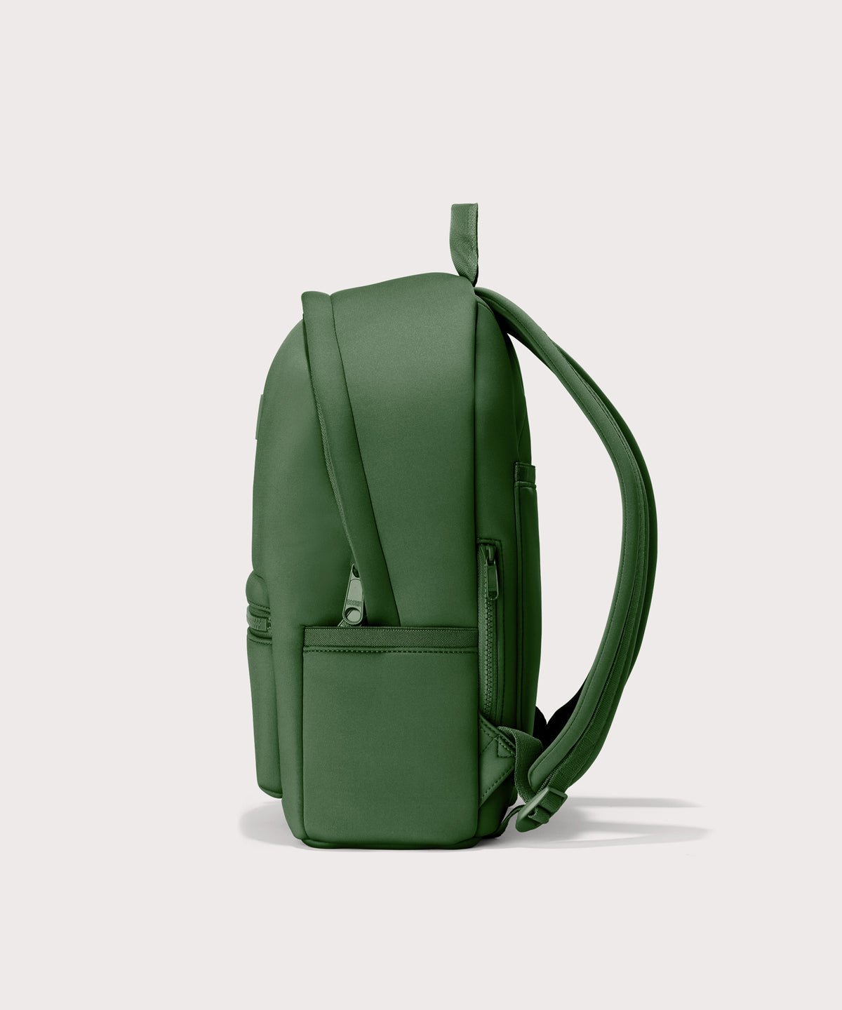 Dagne Dover medium Dakota Neoprene Backpack in a rich, classic forest green seen from the side.
