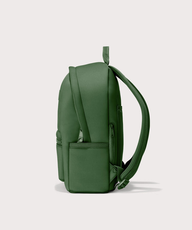 Dagne Dover medium Dakota Neoprene Backpack in a rich, classic forest green seen from the side.
