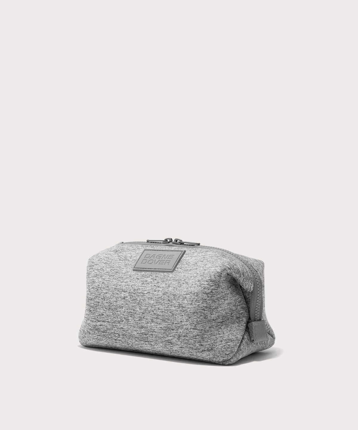 Dagne Dover Large Hunter Toiletry Bag in grey seen from an angle.
