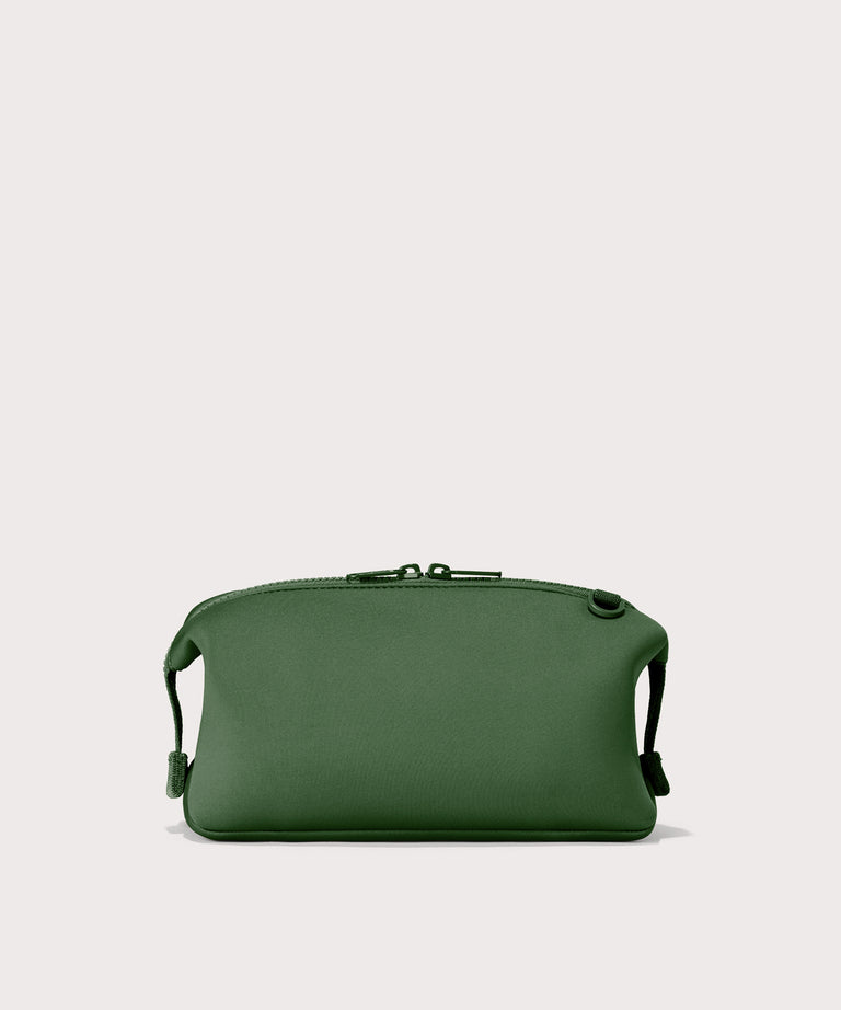 Dagne Dover large Hunter Toiletry Bag in a rich, classic forest green seen from the back.
