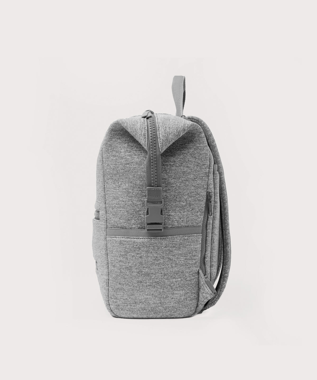 Dagne Dover Large Indi Diaper Backpack in grey seen from the side.
