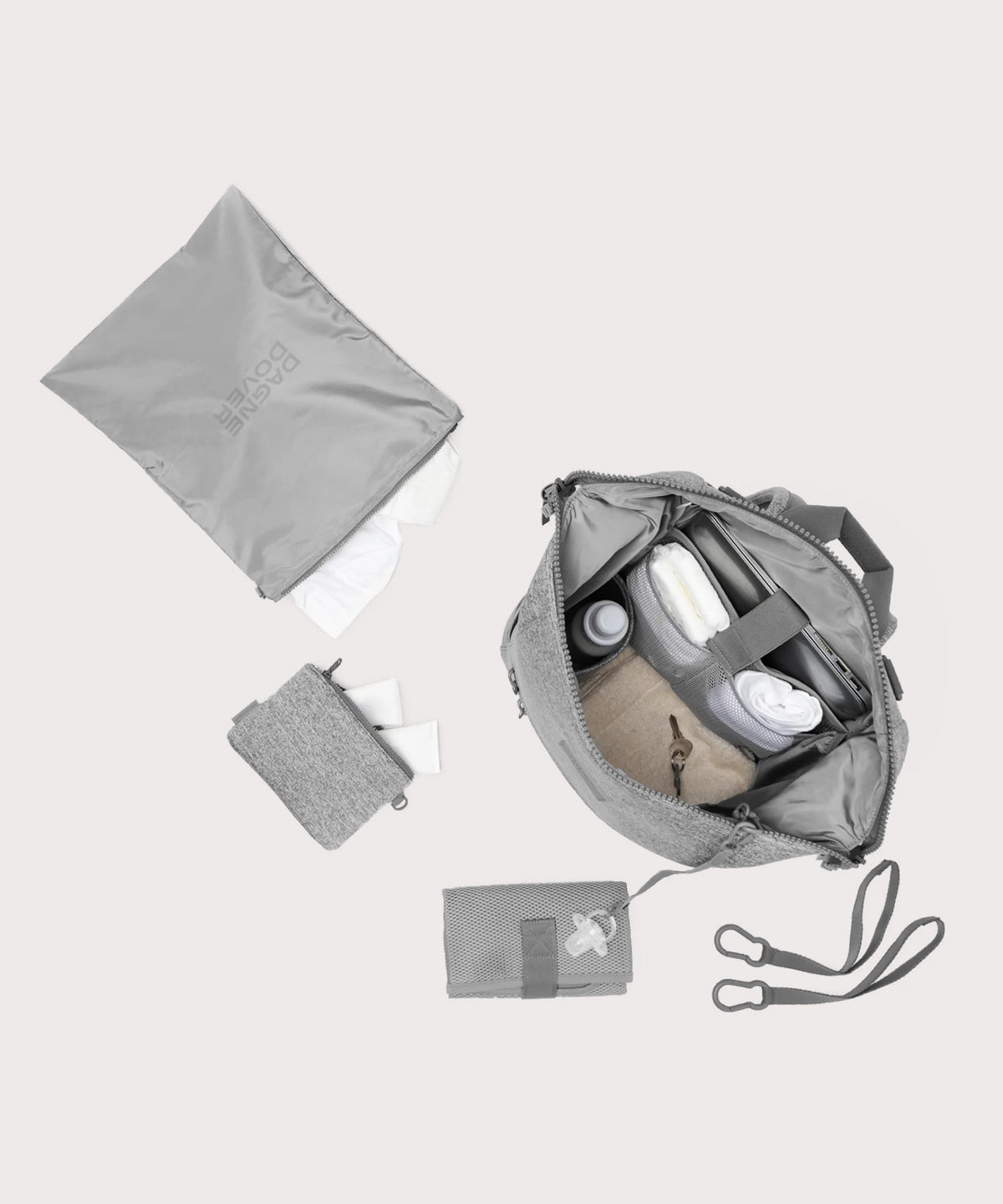 Dagne Dover Large Indi Diaper Backpack in grey showing it's water resistant bag, interior pockets, and changing mat.