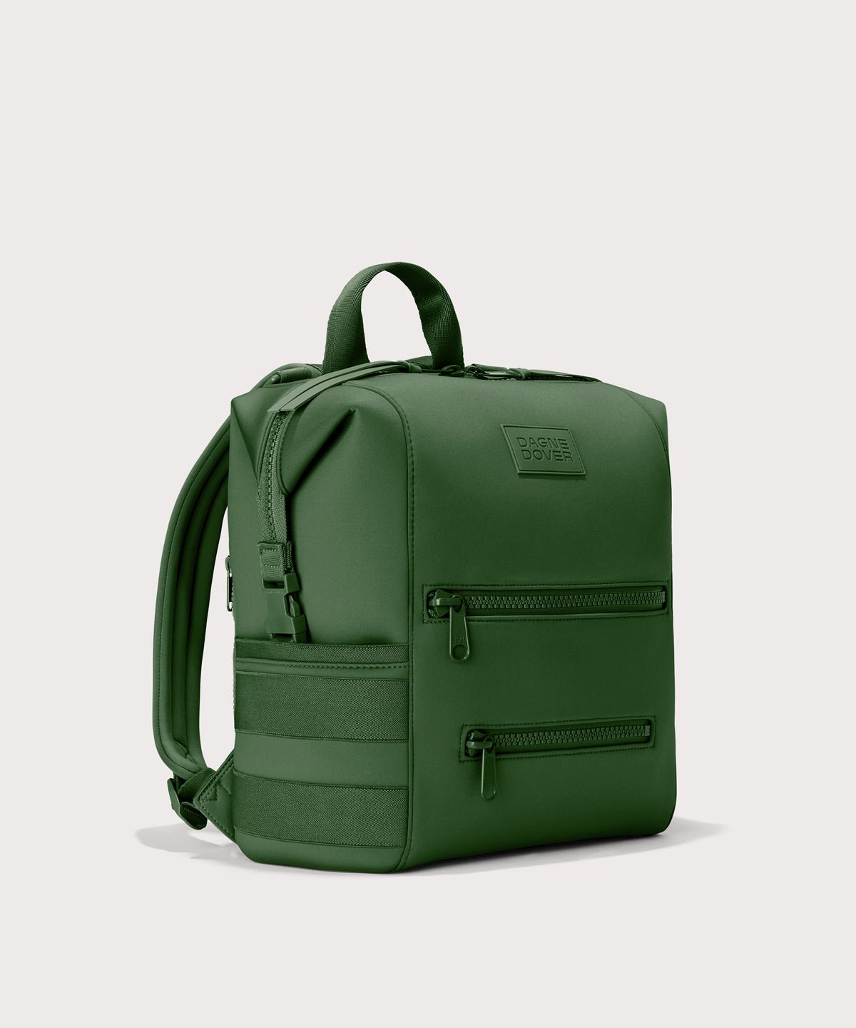 Dagne Dover Medium Indi Diaper Backpack in a rich, classic forest green. seen from an angle.
