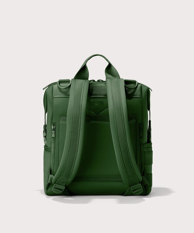 Dagne Dover Medium Indi Diaper Backpack in a rich, classic forest green. seen from the back.
