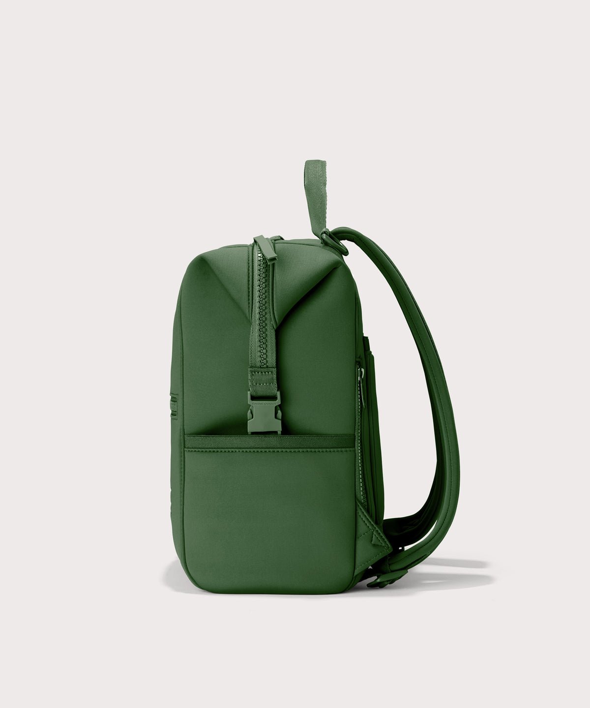 Dagne Dover Medium Indi Diaper Backpack in a rich, classic forest green. seen from the side.
