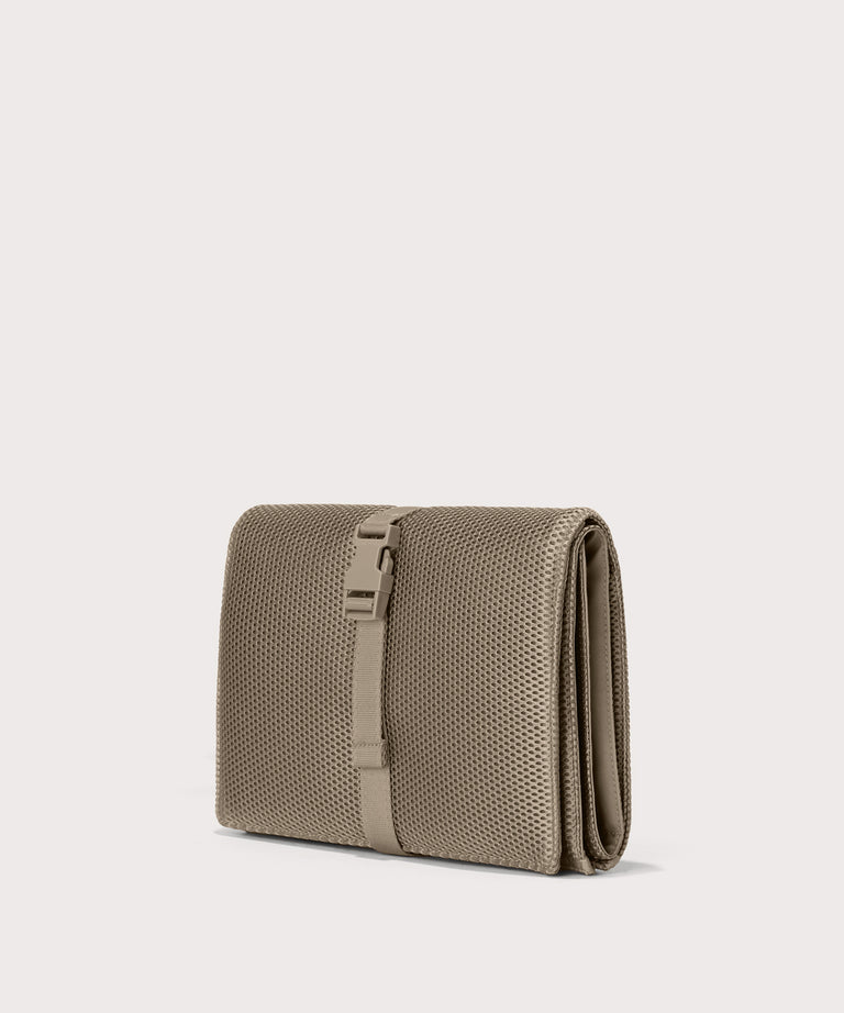 Dagne Dover Joey Changing Kit in khaki seen from an angle.
